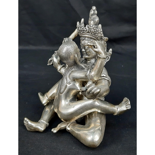 176 - An antique, Tibetan silver, statue, inspired by the ancient Sanskrit text of Kama Sutra. It consists... 