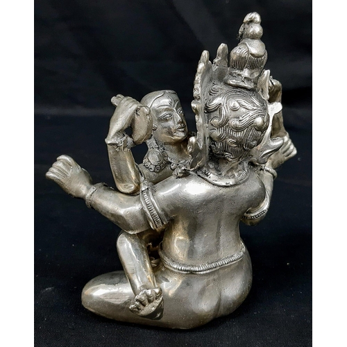 176 - An antique, Tibetan silver, statue, inspired by the ancient Sanskrit text of Kama Sutra. It consists... 