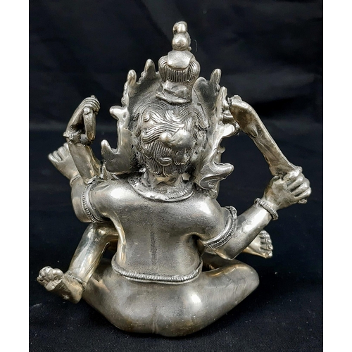 176 - An antique, Tibetan silver, statue, inspired by the ancient Sanskrit text of Kama Sutra. It consists... 