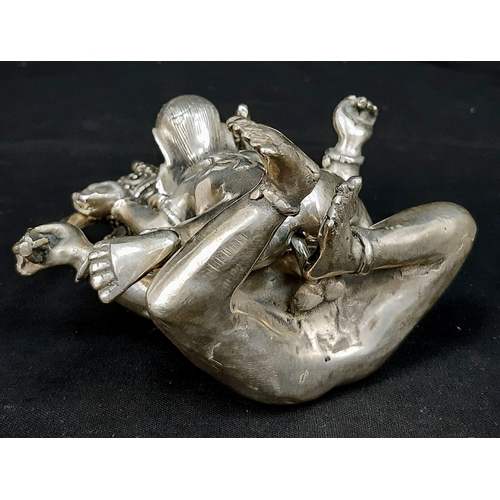 176 - An antique, Tibetan silver, statue, inspired by the ancient Sanskrit text of Kama Sutra. It consists... 