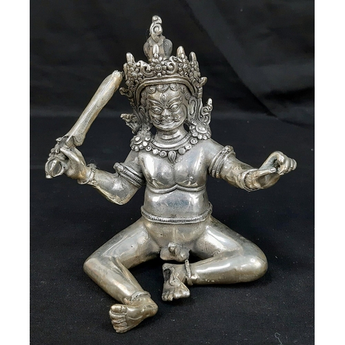 176 - An antique, Tibetan silver, statue, inspired by the ancient Sanskrit text of Kama Sutra. It consists... 