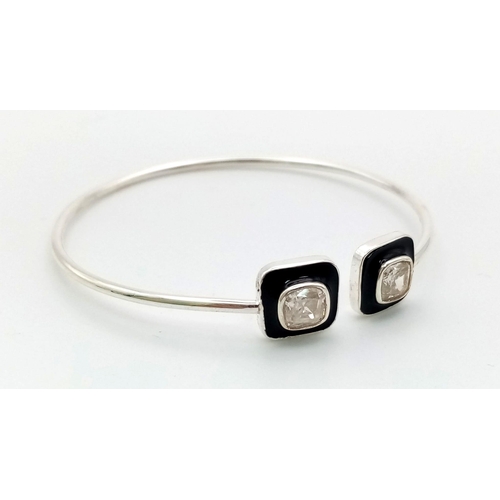 950 - A Designer 2 Cushion Shape Moissanite Open Bracelet,  with  2ct of white moissanites set in black en... 