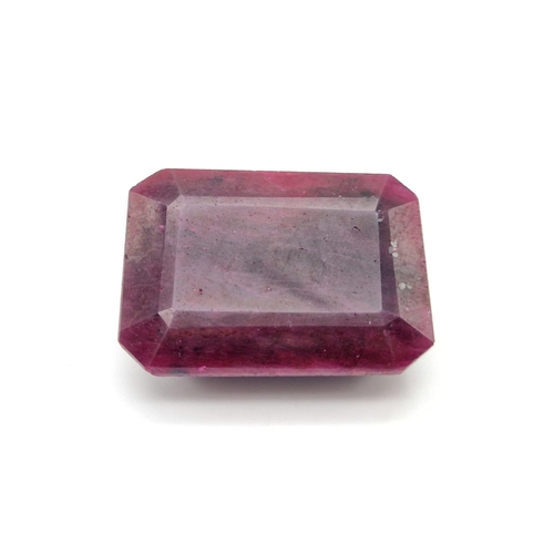 1135 - A 241ct Rectangular Step-Cut  Ruby Gemstone. Crystalline inclusions and Colour enhanced. GLI Certifi... 