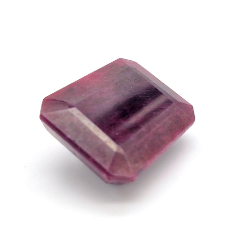 1135 - A 241ct Rectangular Step-Cut  Ruby Gemstone. Crystalline inclusions and Colour enhanced. GLI Certifi... 