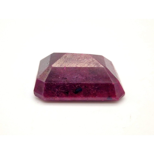 1135 - A 241ct Rectangular Step-Cut  Ruby Gemstone. Crystalline inclusions and Colour enhanced. GLI Certifi... 