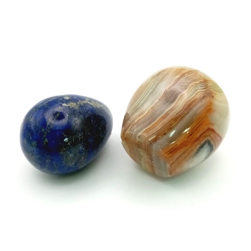 1121 - An Agate Apple - 203g. Dim-1.60 x 1.50 in and a Lapis Lazulis Egg -131g. Dim- 1.70 x 1.50inches.