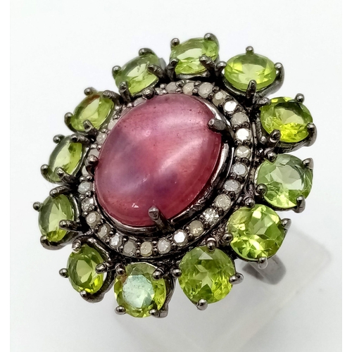 1023 - A Ruby and Peridot Floral Inspired Gemstone Ring - with .46ct Diamond Accents, ruby weight 7.50ct an... 