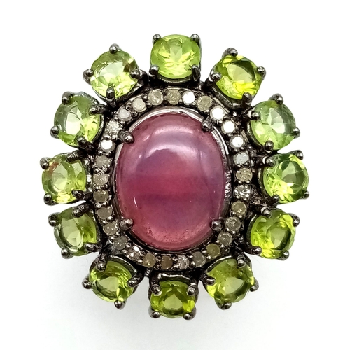 1023 - A Ruby and Peridot Floral Inspired Gemstone Ring - with .46ct Diamond Accents, ruby weight 7.50ct an... 