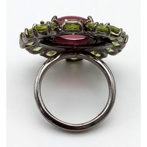 1023 - A Ruby and Peridot Floral Inspired Gemstone Ring - with .46ct Diamond Accents, ruby weight 7.50ct an... 