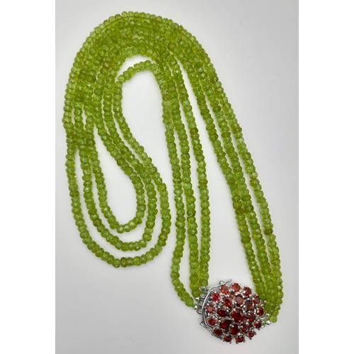 1132 - 3 Row Peridot Gemstone Necklace with Garnet Clasp in 925 Silver, 440cts in total , Comes on side as ... 