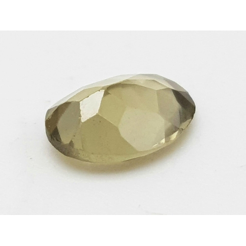 938 - A 1.38ct Tourmaline. Earth Mined, Oval cut, Crystal inclusions. IDT Certified.