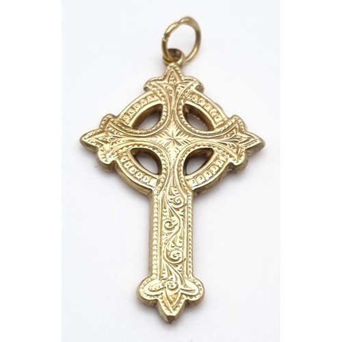 1487 - An Antique Victorian Yellow Metal Cross with a 9K yellow Gold Smoky Quartz Spinning Fob. Total weigh... 