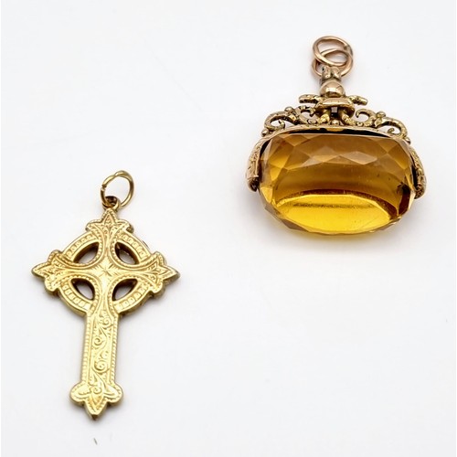 1487 - An Antique Victorian Yellow Metal Cross with a 9K yellow Gold Smoky Quartz Spinning Fob. Total weigh... 