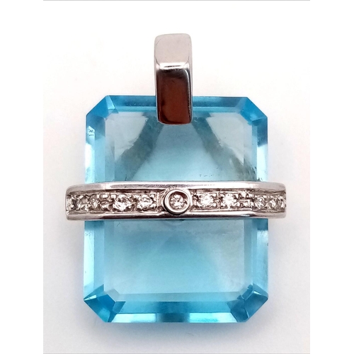 1479 - A BLUE TOPAZ AND DIAMOND PENDANT TASTEFULLY SET IN 18K WHITE GOLD,  7.3gms