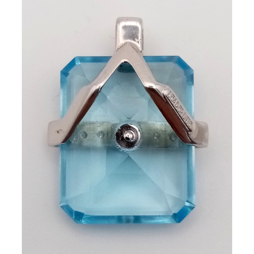 1479 - A BLUE TOPAZ AND DIAMOND PENDANT TASTEFULLY SET IN 18K WHITE GOLD,  7.3gms