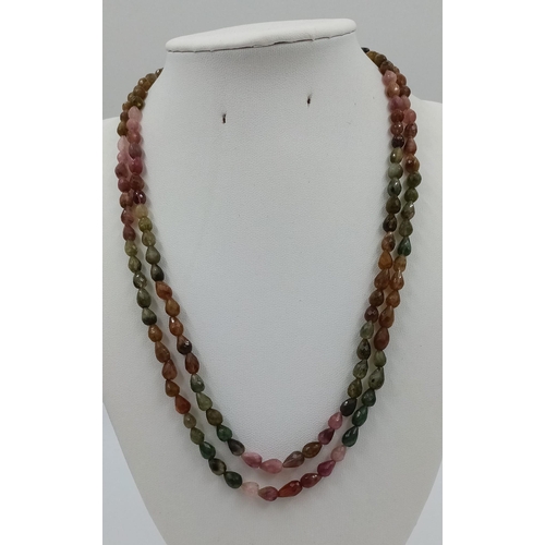 1491 - A 168ct Fancy Tourmaline Drop shape beads necklace with Ruby Clasp in 925 Silver. 44cm.