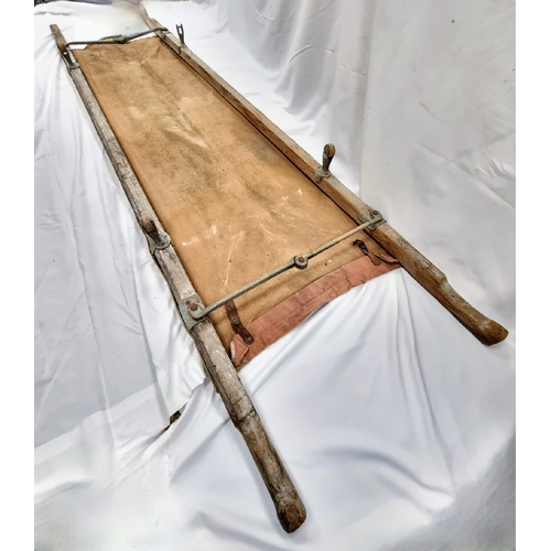 1474 - A Rare WW1 British Army Canvas Stretcher on Four Small Wheels. 230cm total length. I suggest the win... 