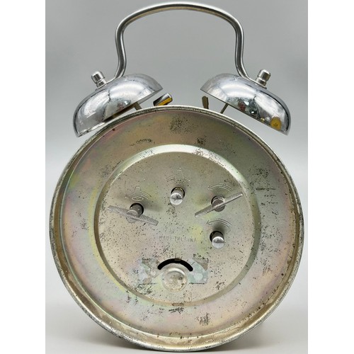 1423 - A YELLOW VINTAGE ALADDIN DOUBLE BELL ALARM CLOCK. HEIGHT 18CM. AS FOUND.