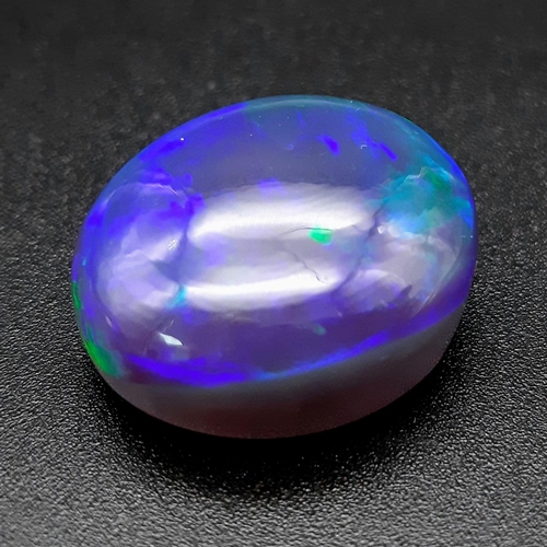 113 - A gorgeous and highly collectable, large (30.6 carats), BLUE OPAL cabochon from Lightning Ridge, New... 