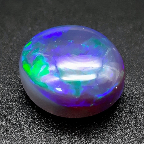 113 - A gorgeous and highly collectable, large (30.6 carats), BLUE OPAL cabochon from Lightning Ridge, New... 