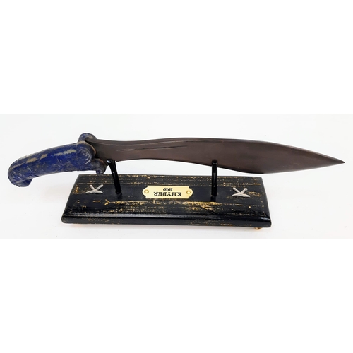 127 - An antique, commemorative, bronze GURKHA KUKRI with a hand carved lapis lazuli hilt on a custom made... 