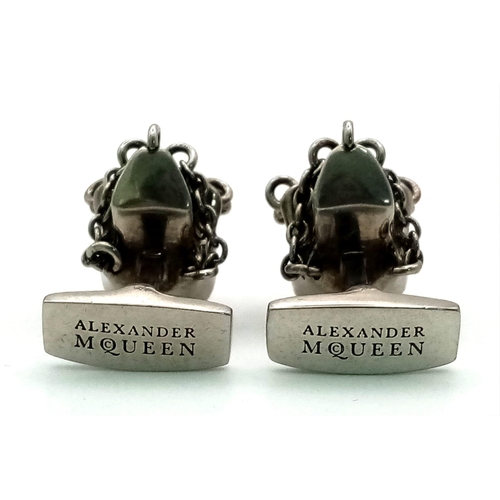 148 - An Iconic ALEXANDER MCQUENN sculls pair of cufflinks. In excellent condition with original travel cl... 