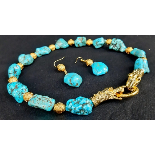 183 - A glorious Chinese necklace and earrings set with turquoise nuggets and an 18 K yellow gold filled c... 