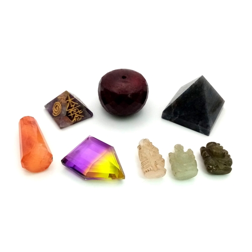 968 - A Mixed Lot of Gems. A Huge Ruby drilled bead. (71gms, 1 x 1 inches). An Iolite Pyramid (44gms, 1.10... 