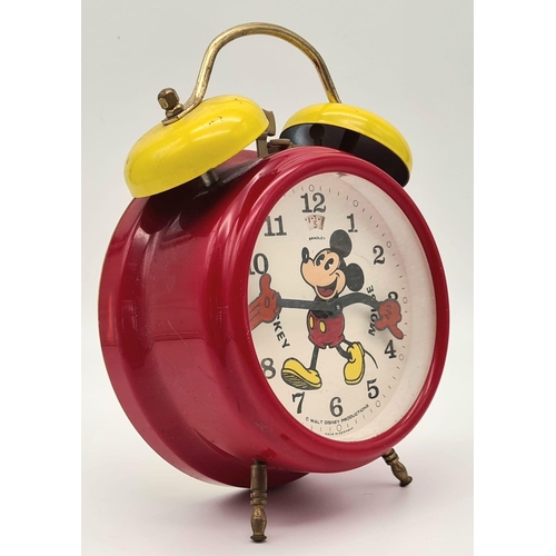 1435 - A Vintage German Made Mickey Mouse Double Bell Alarm Clock. 18cm tall. Works but a/f.