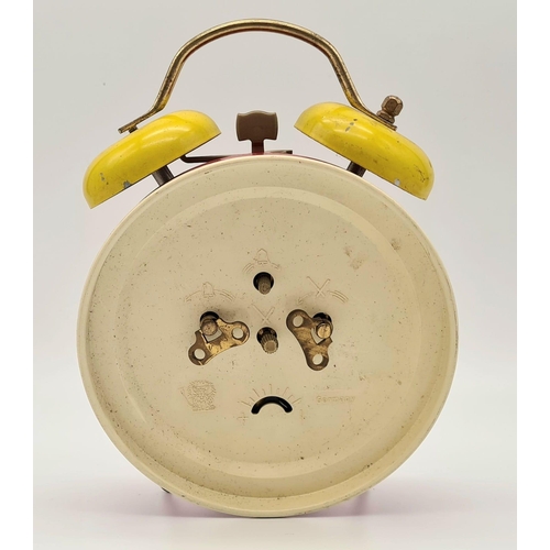 1435 - A Vintage German Made Mickey Mouse Double Bell Alarm Clock. 18cm tall. Works but a/f.