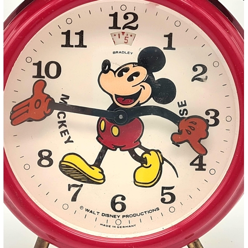 1435 - A Vintage German Made Mickey Mouse Double Bell Alarm Clock. 18cm tall. Works but a/f.