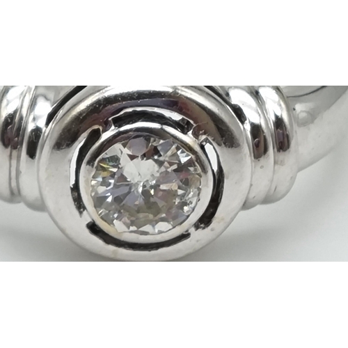 1287 - An 18K White Gold Diamond Solitaire Ring. Round cut diamond - 0,60ct. J-SI Grade. Size O. 5.5g.