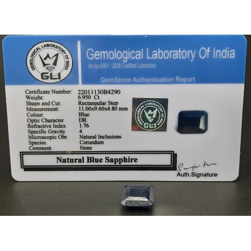 1383 - A 6.95ct Blue Sapphire - Rectangular shape. Comes with a certificate.