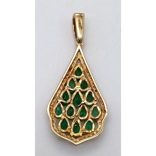 1181 - A Vintage Emerald and Diamond 925 Gilded Teardrop Pendant. 13 small teardrop emeralds with a diamond... 