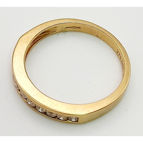 729 - A 9K Yellow Gold Diamond Half Eternity Ring. Size L. Total weight: 1.93g