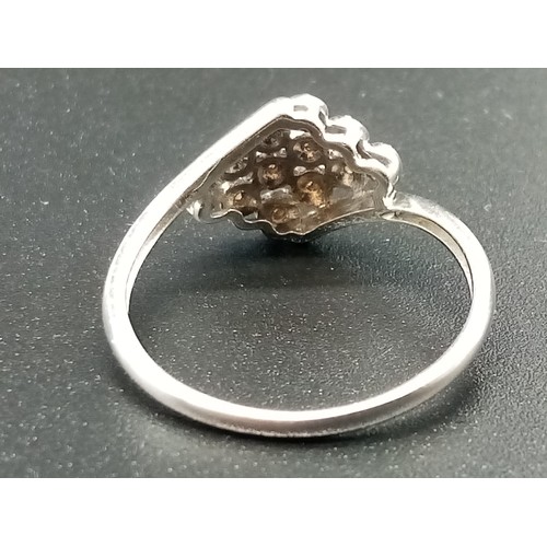 687 - A 9K White Gold 12 Diamonds Crossover Ring. Size S. Total weight: 2.14g