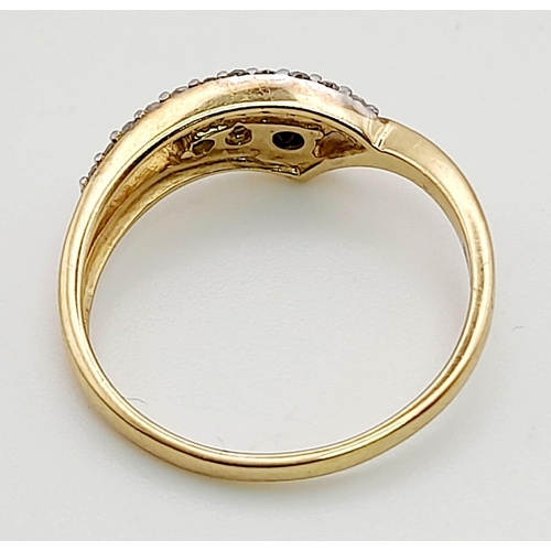 827 - A 9k Yellow Gold Chevron Black and White Diamonds Ring. Size S. Total weight: 2.38g