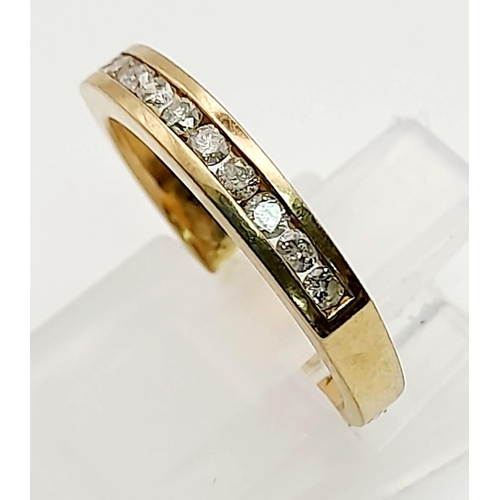 1141 - A 9K Yellow Gold Diamond Half Eternity Ring. Size K. Total weight: 1.89g