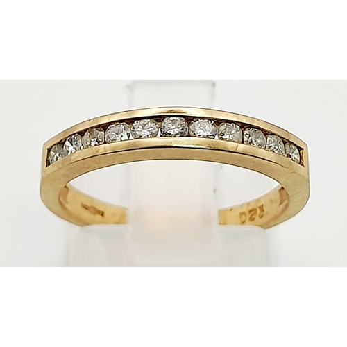 1141 - A 9K Yellow Gold Diamond Half Eternity Ring. Size K. Total weight: 1.89g