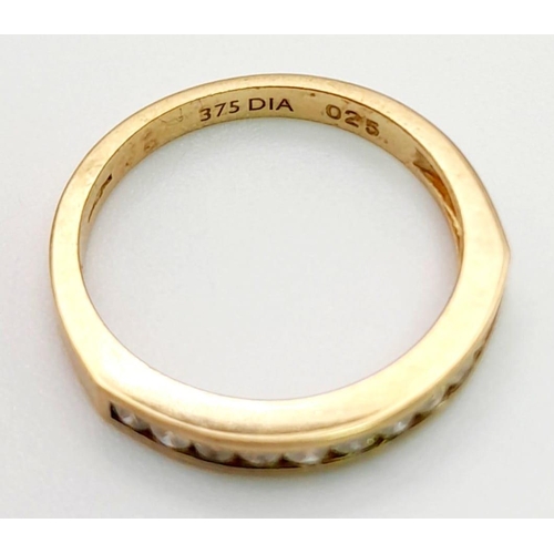 1141 - A 9K Yellow Gold Diamond Half Eternity Ring. Size K. Total weight: 1.89g