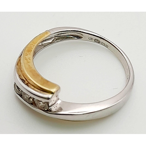 1368 - A 9K White and Yellow Gold Crossover Ring with 3 Separated diamonds. Size L/M. Total weight: 2.57g