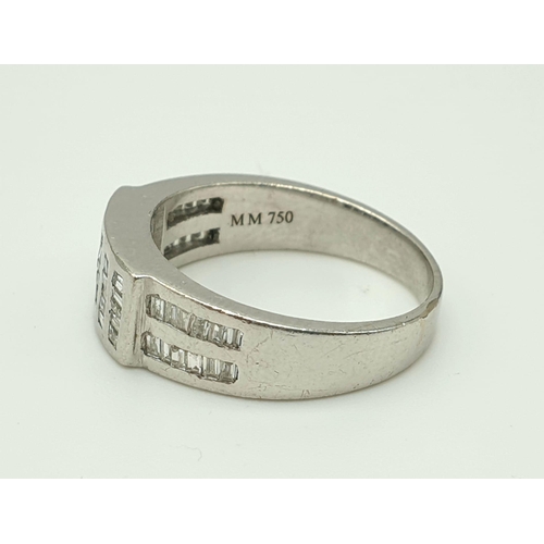 820 - An 18K White Gold Diamond Band Ring - Vertical and horizontal diamond bands. Size M. 5.63g