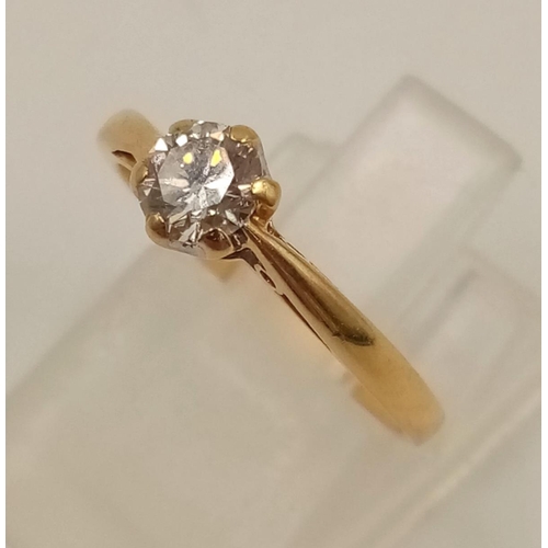 1031 - An 18K Yellow Gold Diamond Solitaire Ring. 0.35ct.
Size J. 1.82g.