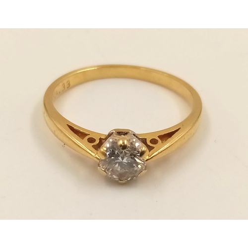 1031 - An 18K Yellow Gold Diamond Solitaire Ring. 0.35ct.
Size J. 1.82g.