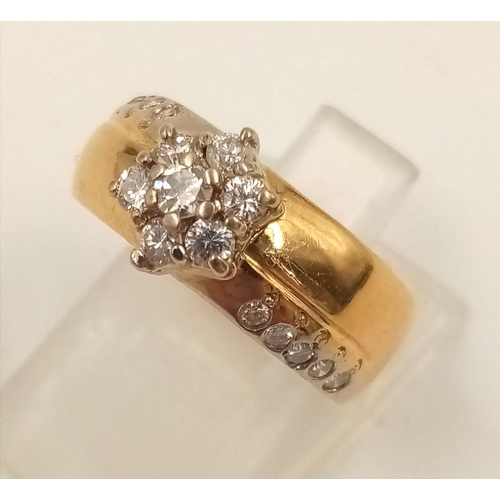 358 - An 18K Yellow Gold Diamond Cluster Ring. Star-shaped central diamond with diamond tail offshoots. Si... 