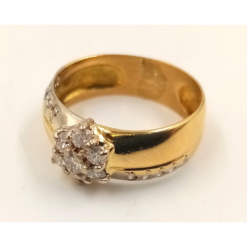 358 - An 18K Yellow Gold Diamond Cluster Ring. Star-shaped central diamond with diamond tail offshoots. Si... 