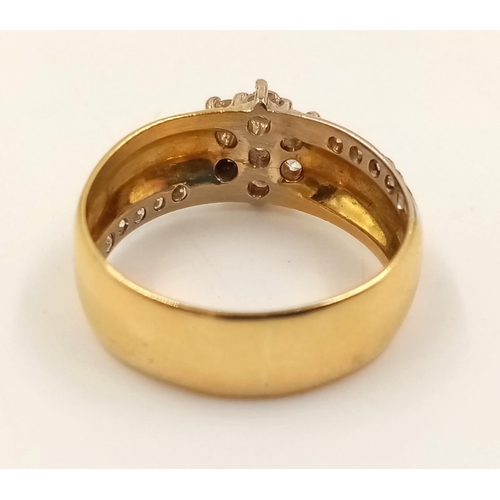 358 - An 18K Yellow Gold Diamond Cluster Ring. Star-shaped central diamond with diamond tail offshoots. Si... 