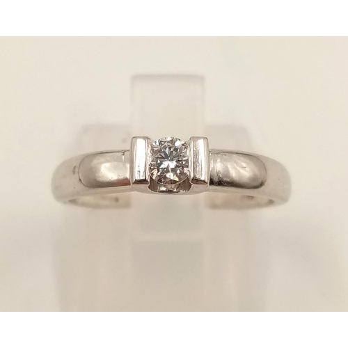 813 - An 18K White Gold Diamond Solitaire Ring. Size L.
2.8g