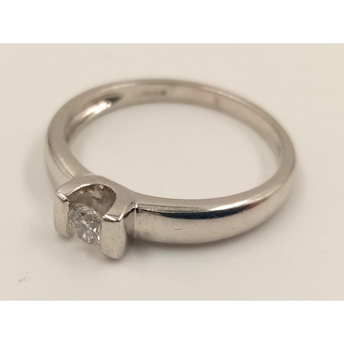 813 - An 18K White Gold Diamond Solitaire Ring. Size L.
2.8g