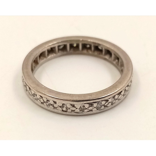 624 - An 18K White Gold Diamond Eternity Ring. Size M.
4.38g.